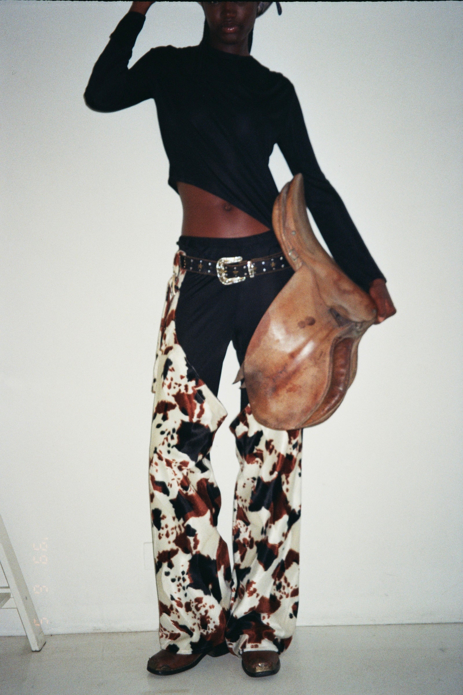 DALLAS CHAPS IN COW PATTERN FAKE FUR
