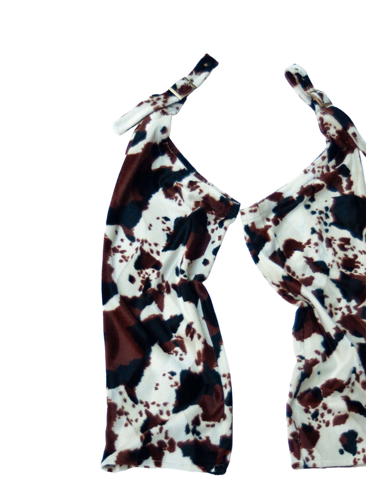 DALLAS CHAPS IN COW PATTERN FAKE FUR