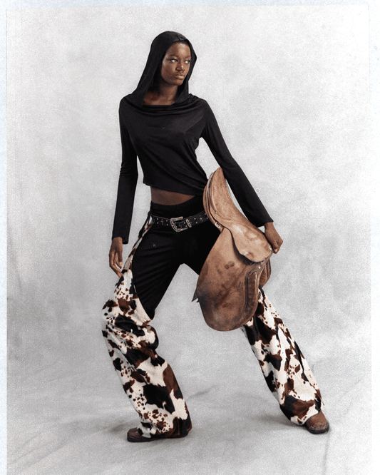 DALLAS CHAPS IN COW PATTERN FAKE FUR